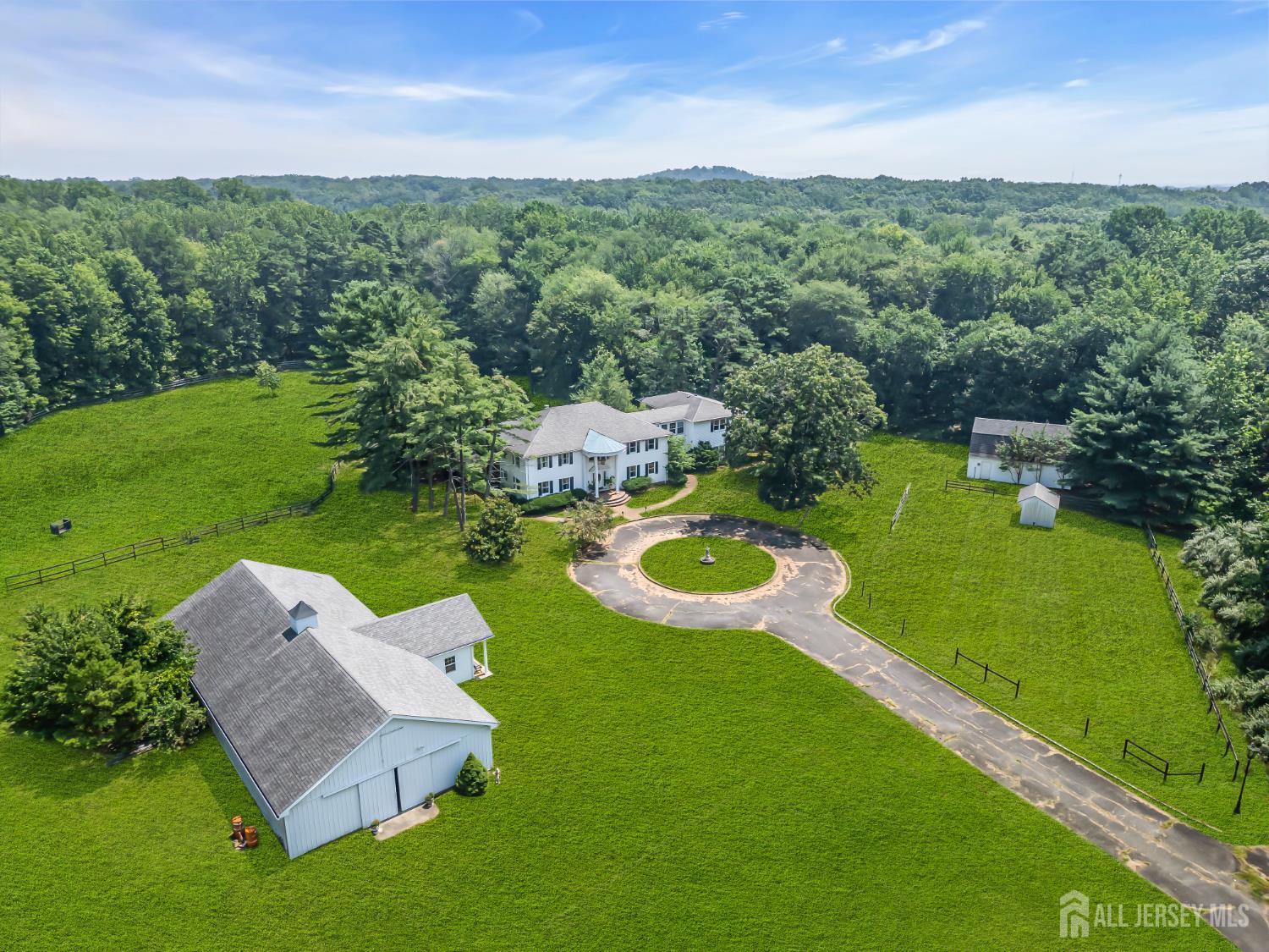 447 Stagecoach Road Millstone Township, NJ 08510 - Photo 29 of 46 an aerial view of a house with outdoor space swimming pool a big yard and outdoor seating