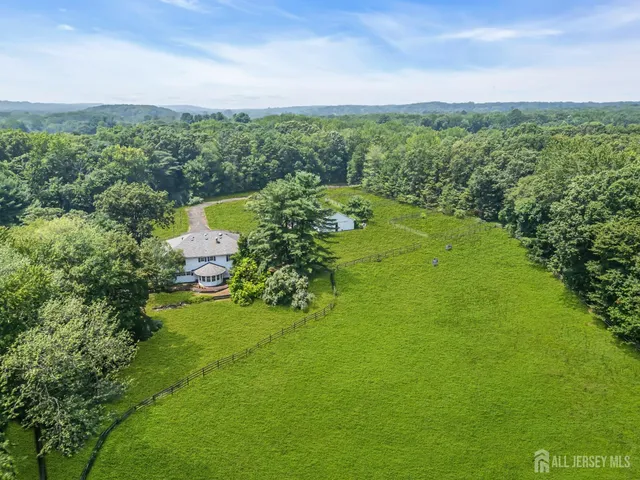 a view of a lake with a yard
