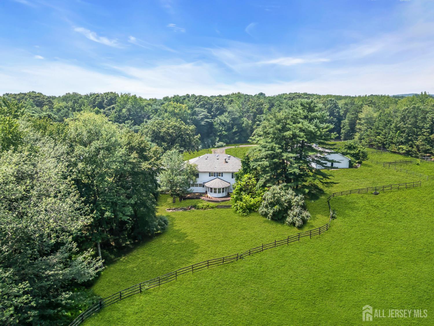 447 Stagecoach Road Millstone Township, NJ 08510 - Photo 33 of 46 a view of a big yard with large trees