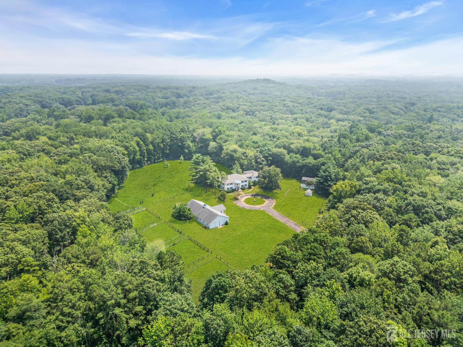 447 Stagecoach Road Millstone Township, NJ 08510 - Photo 34 of 46 a view of a big yard with lots of green space