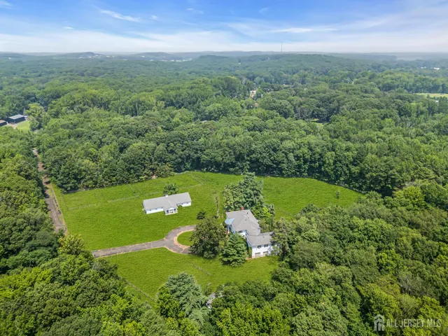 a view of a lake with a yard