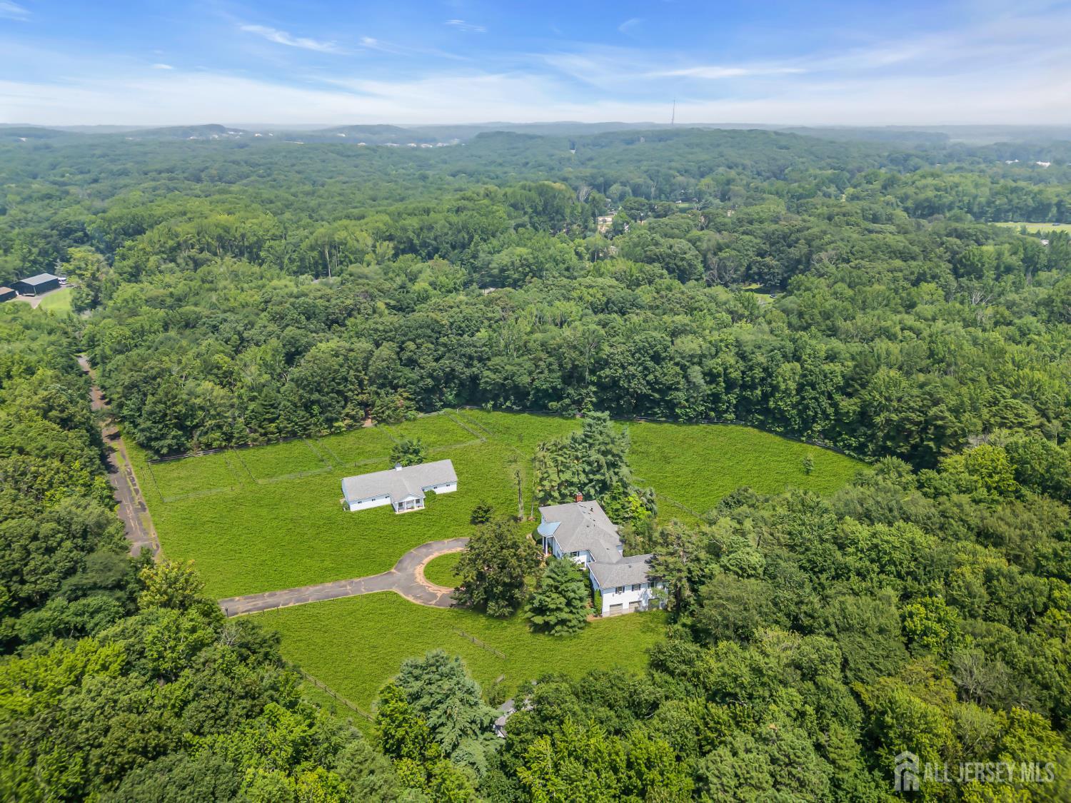 447 Stagecoach Road Millstone Township, NJ 08510 - Photo 36 of 46 a view of a lake with a yard