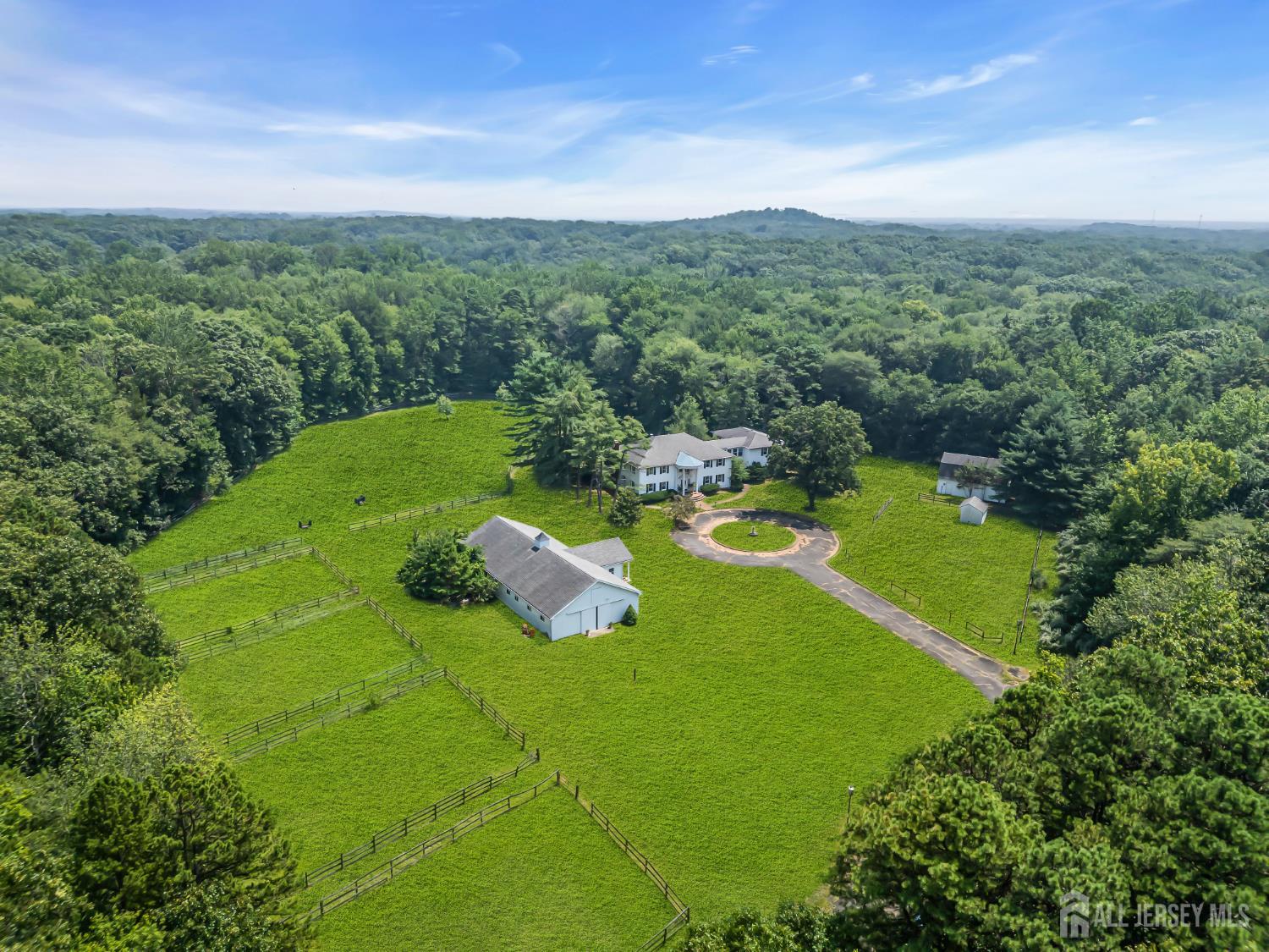 447 Stagecoach Road Millstone Township, NJ 08510 - Photo 39 of 46 a view of a golf course with chairs