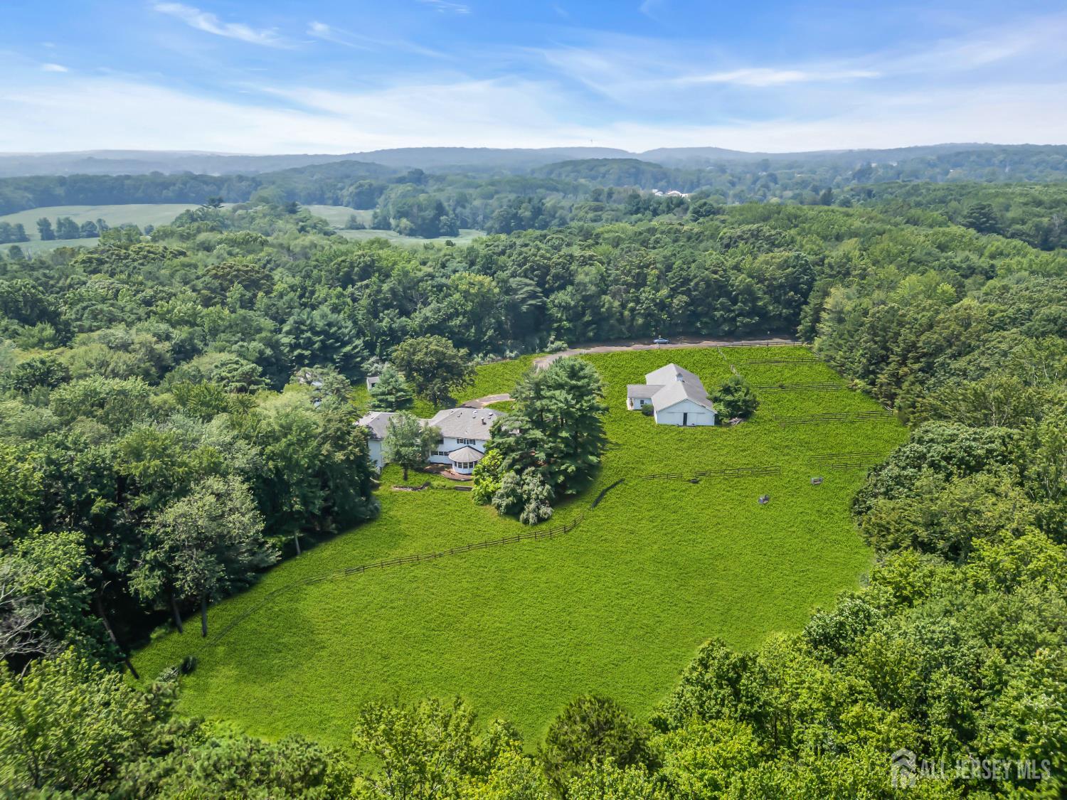 447 Stagecoach Road Millstone Township, NJ 08510 - Photo 43 of 46 a view of a green yard
