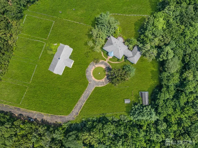 an aerial view of a golf course with a park