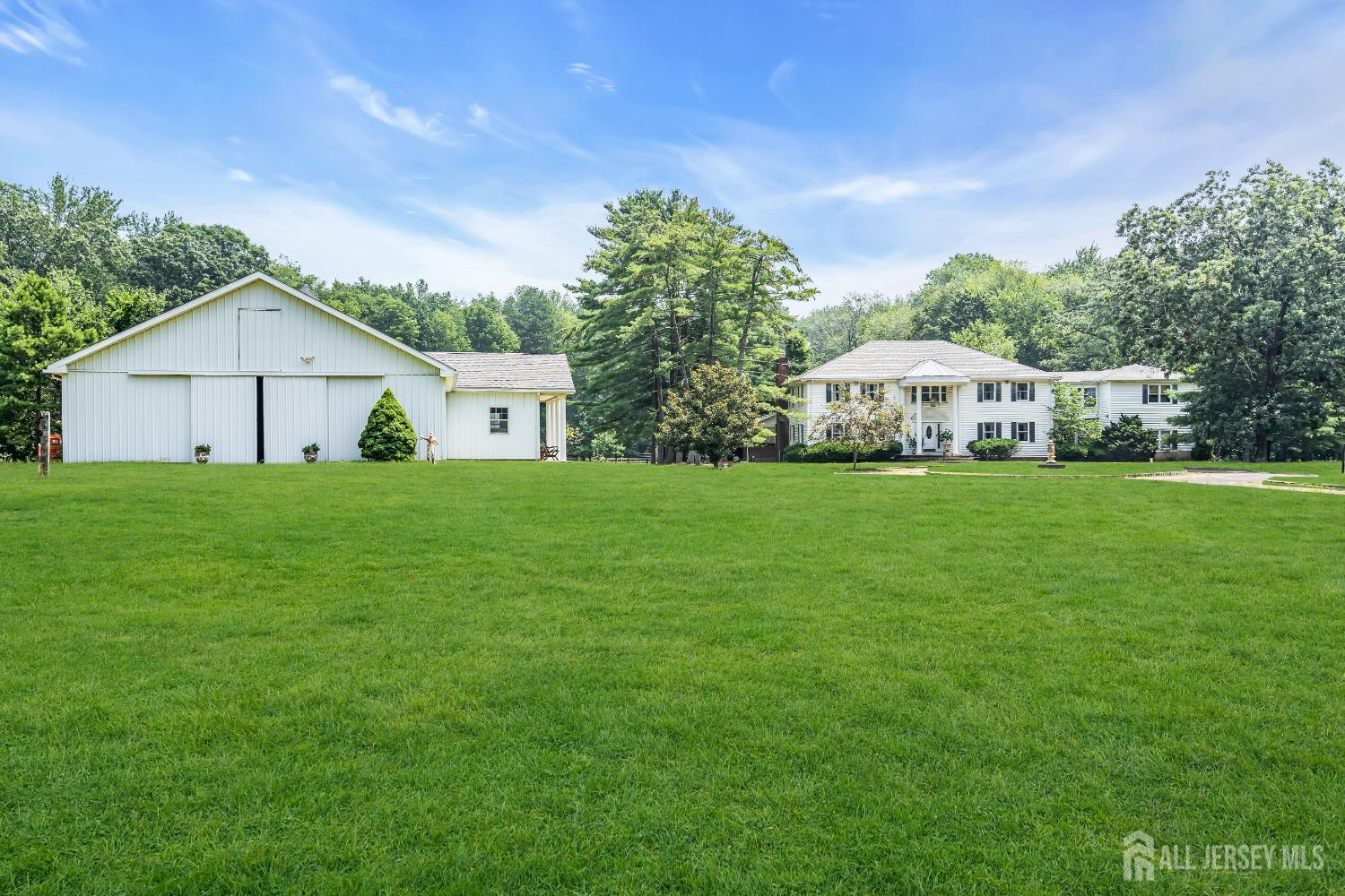 447 Stagecoach Road Millstone Township, NJ 08510 - Photo 6 of 46 a view of a house with a yard
