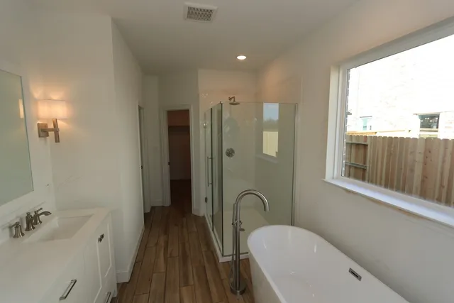 a bathroom with a shower and a toilet