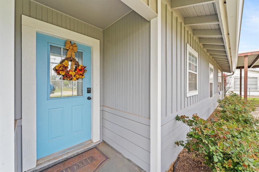 205 Ash Street Bangs, TX 76823 - Photo 1 of 1 a view of a entryway door front of house