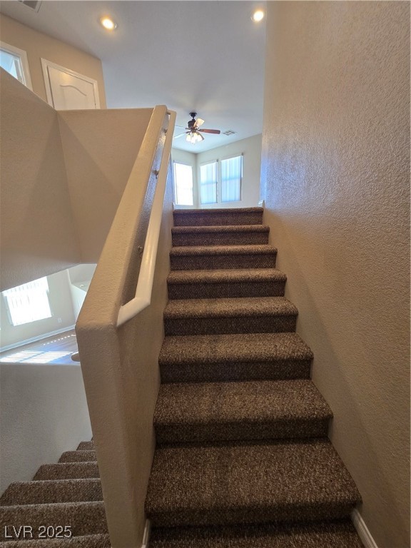 5508 Knotting Pass Las Vegas, NV 89131 - Photo 15 of 45 Staircase featuring a textured wall, recessed lighting, and a ceiling fan