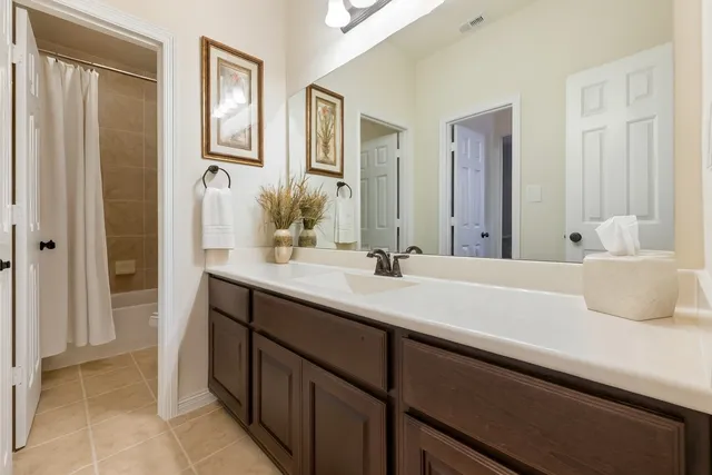 a bed room with a bed and a couch