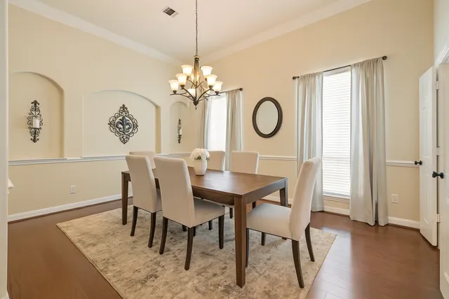 a large bathroom with a large tub and sink