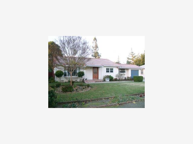 a black and white photo of a house