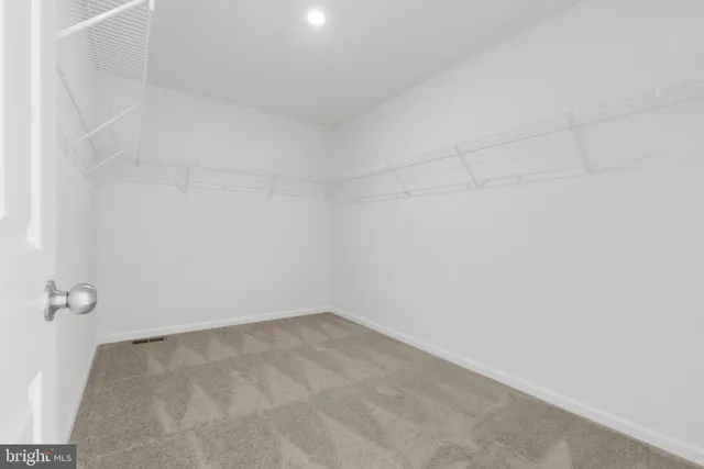 a bathroom with a bathtub and a sink