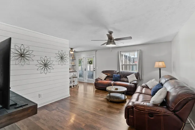 a living room with furniture and window