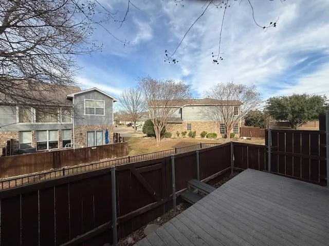 a large kitchen with lots of counter space and sink