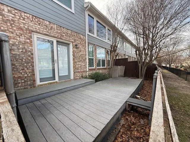 a view of a house with a roof deck