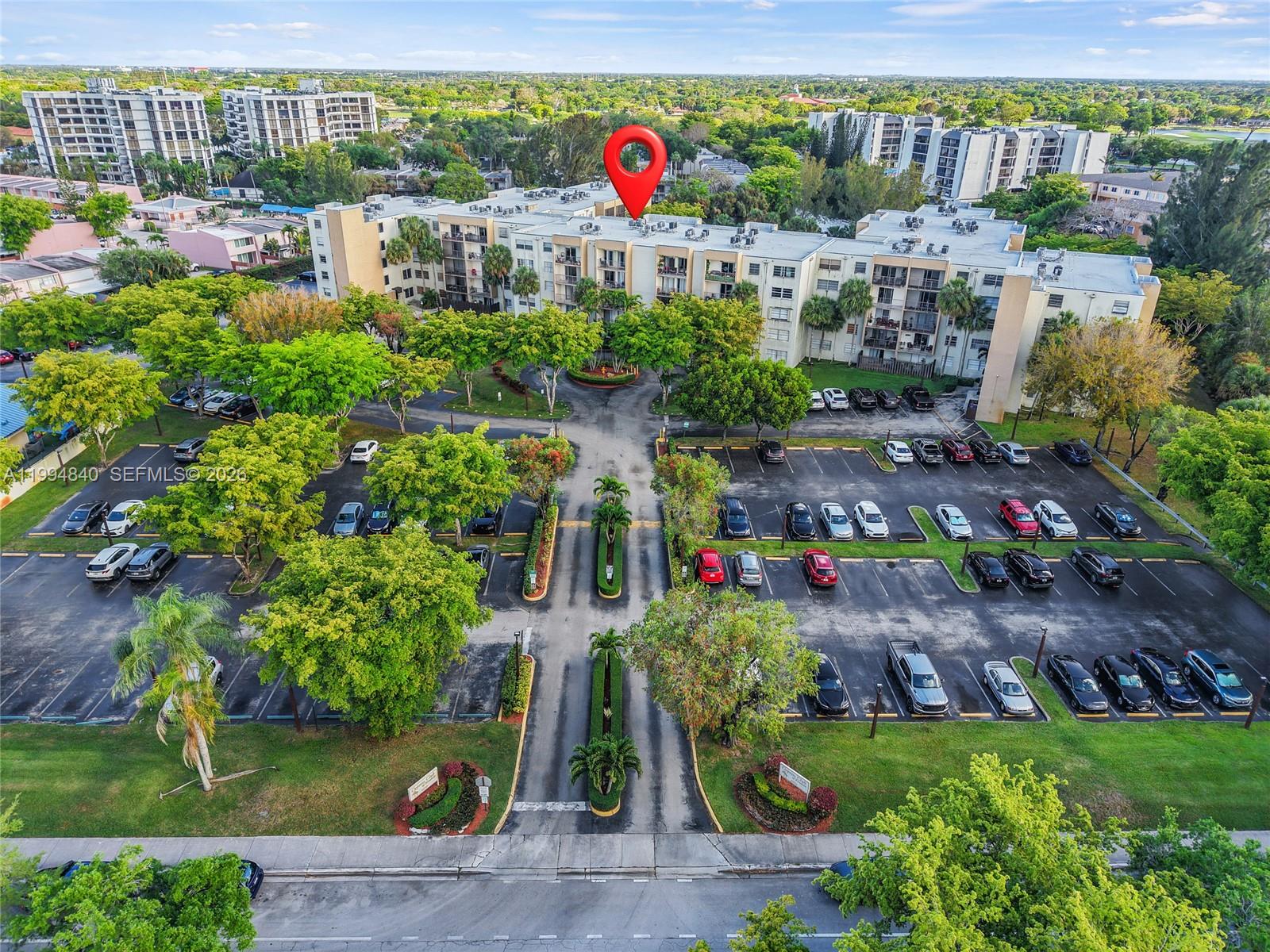 14250 Southwest 62nd Street, Unit 402 Miami, FL 33183 - Photo 2 of 25 a view of swimming pool