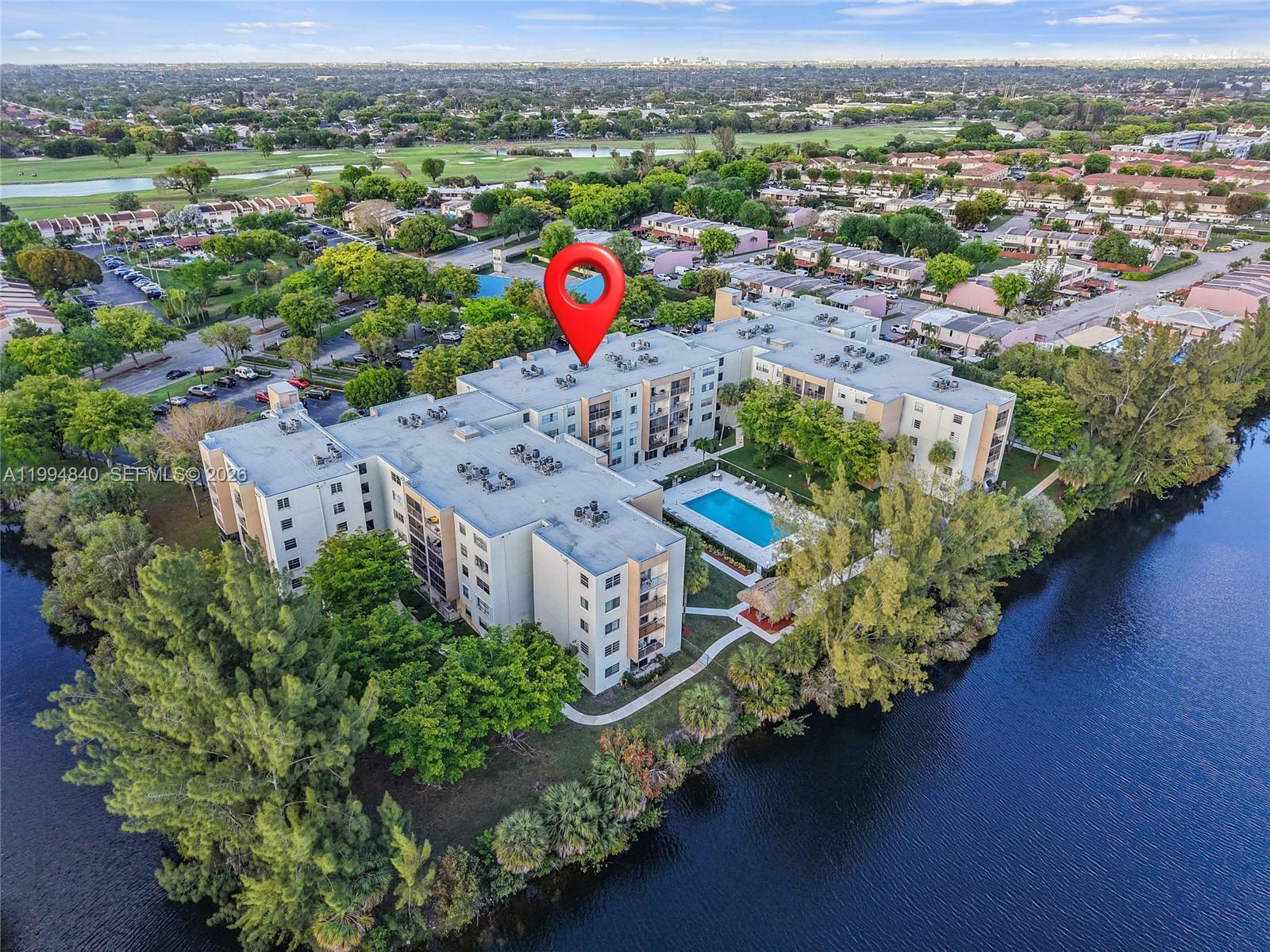 14250 Southwest 62nd Street, Unit 402 Miami, FL 33183 - Photo 22 of 25 an aerial view of a house with a garden