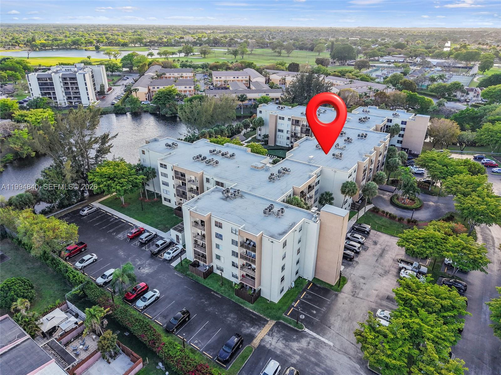 14250 Southwest 62nd Street, Unit 402 Miami, FL 33183 - Photo 23 of 25 an aerial view of multiple house