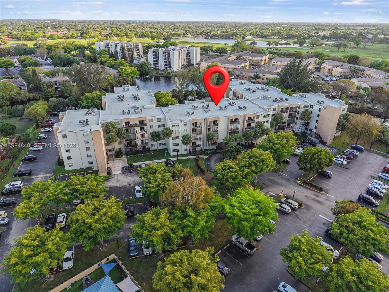 14250 Southwest 62nd Street, Unit 402 Miami, FL 33183 - Photo 24 of 25 an aerial view of residential house with an outdoor space and seating space