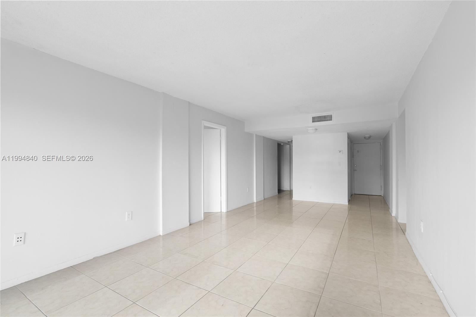 14250 Southwest 62nd Street, Unit 402 Miami, FL 33183 - Photo 9 of 25 a view of an empty room and closet area