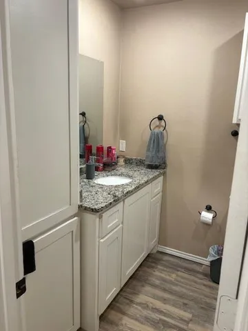 a bathroom with a toilet and a sink