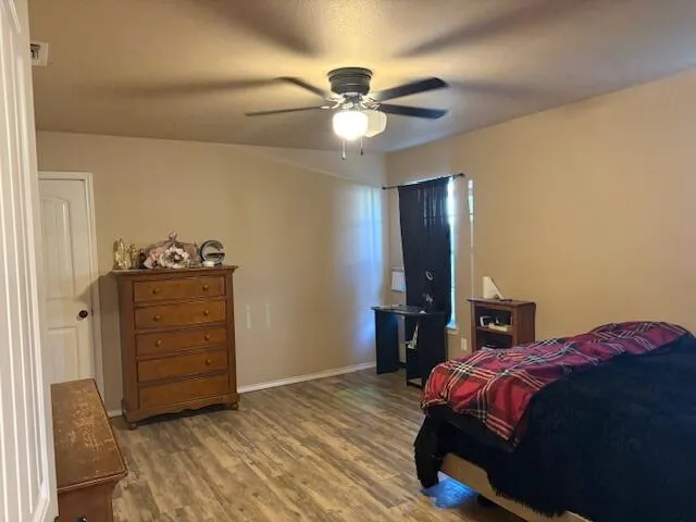 a bathroom with a tub and shower