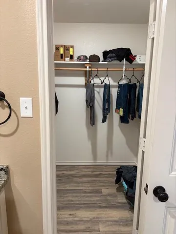 a kitchen with a refrigerator and a sink
