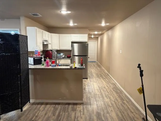 a bed room with a bed and a window