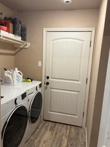 a view of hallway with closet