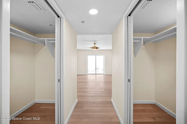 a bathroom with double sink and a mirror