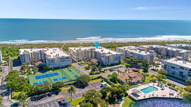 a view of a building with a road