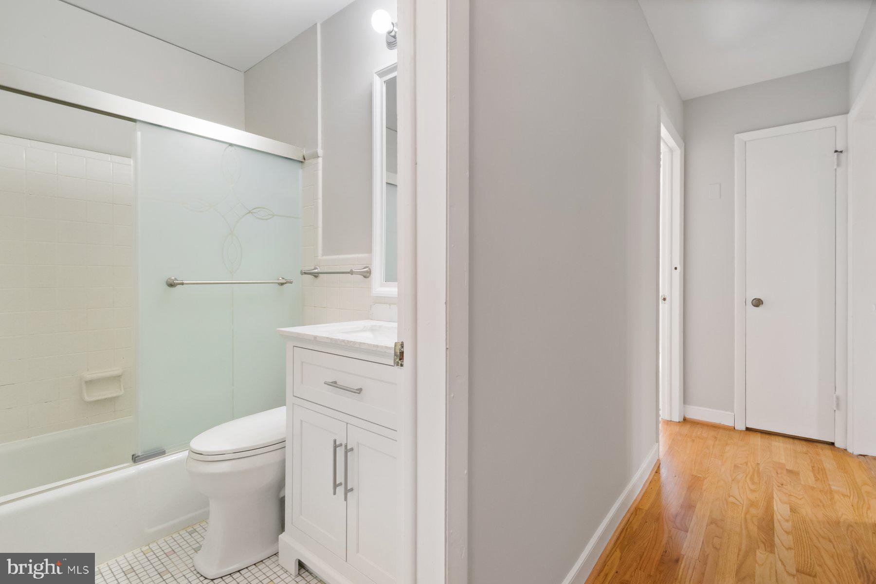 4945 Montgomery Road Ellicott City, MD 21043 - Photo 20 of 37 Hall bath with brand new vanity & mirror