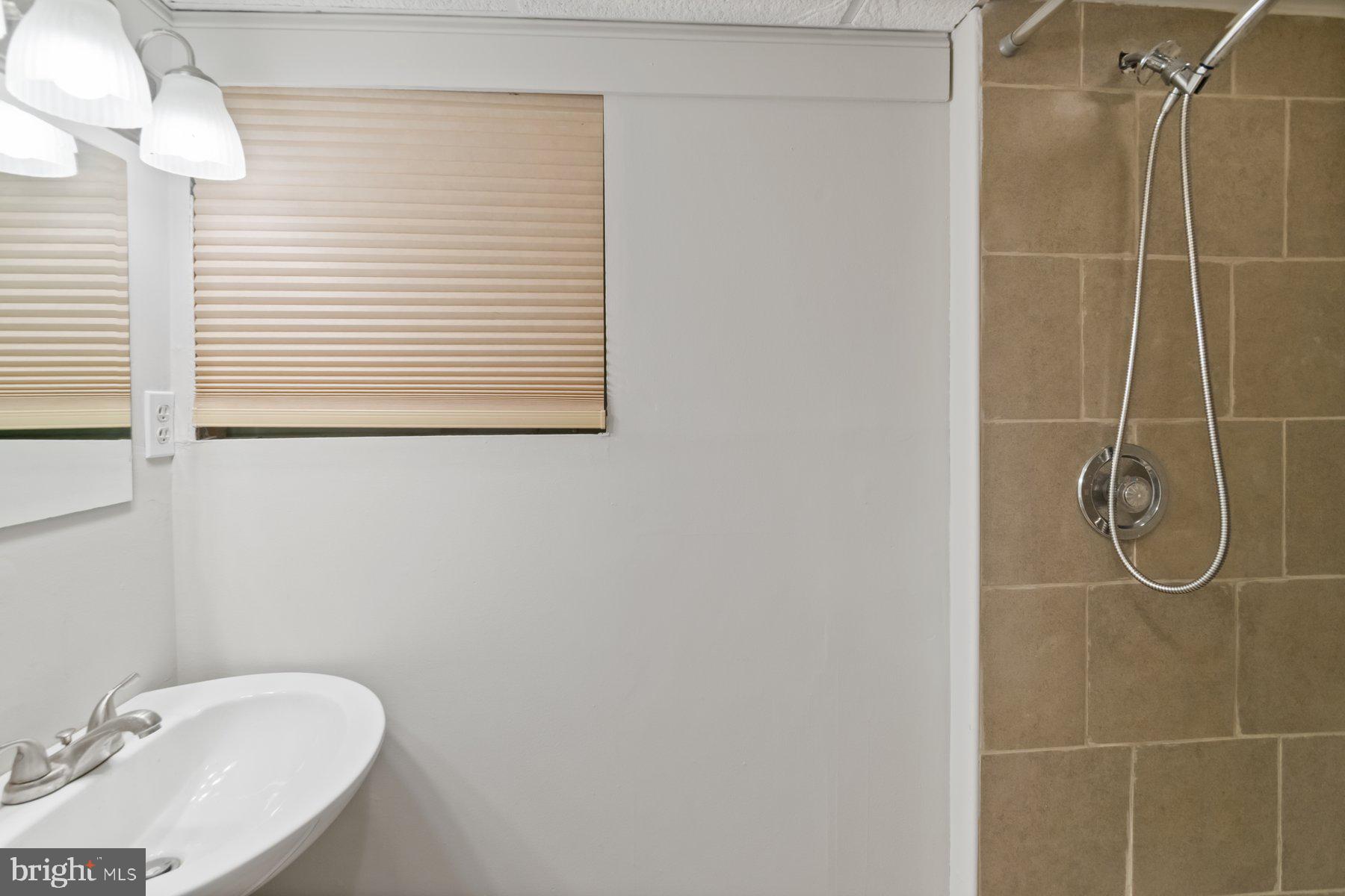 4945 Montgomery Road Ellicott City, MD 21043 - Photo 27 of 37 Lower level full bath