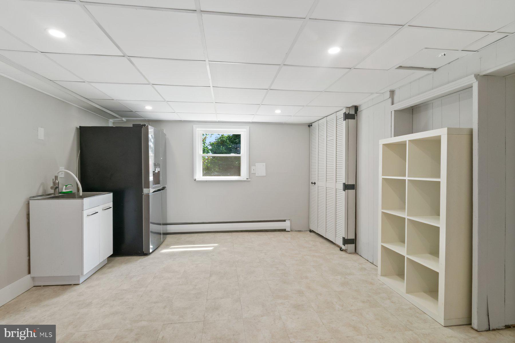 4945 Montgomery Road Ellicott City, MD 21043 - Photo 28 of 37 Utility room with 2nd fridge