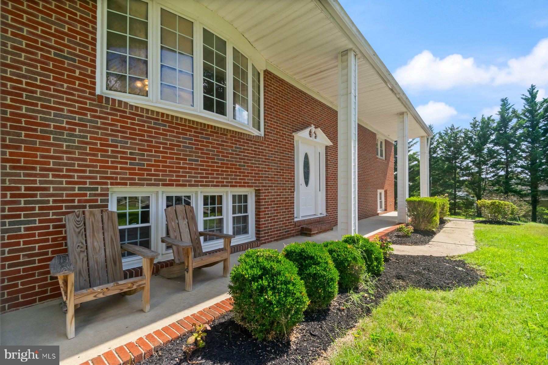 4945 Montgomery Road Ellicott City, MD 21043 - Photo 3 of 37 Extended front porch