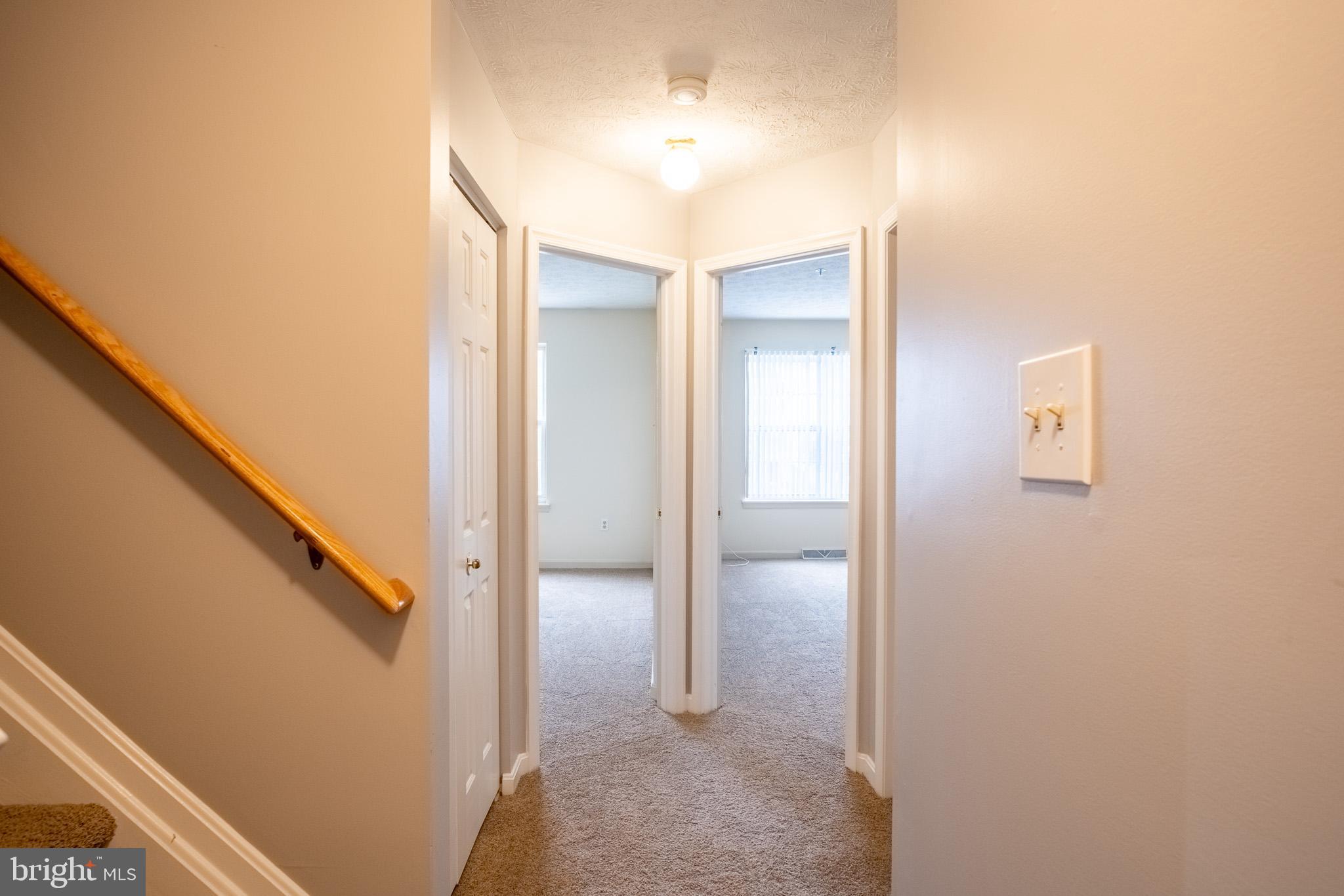 4910 Edgeware Terrace Frederick, MD 21703 - Photo 29 of 34 a view of a hallway with shower