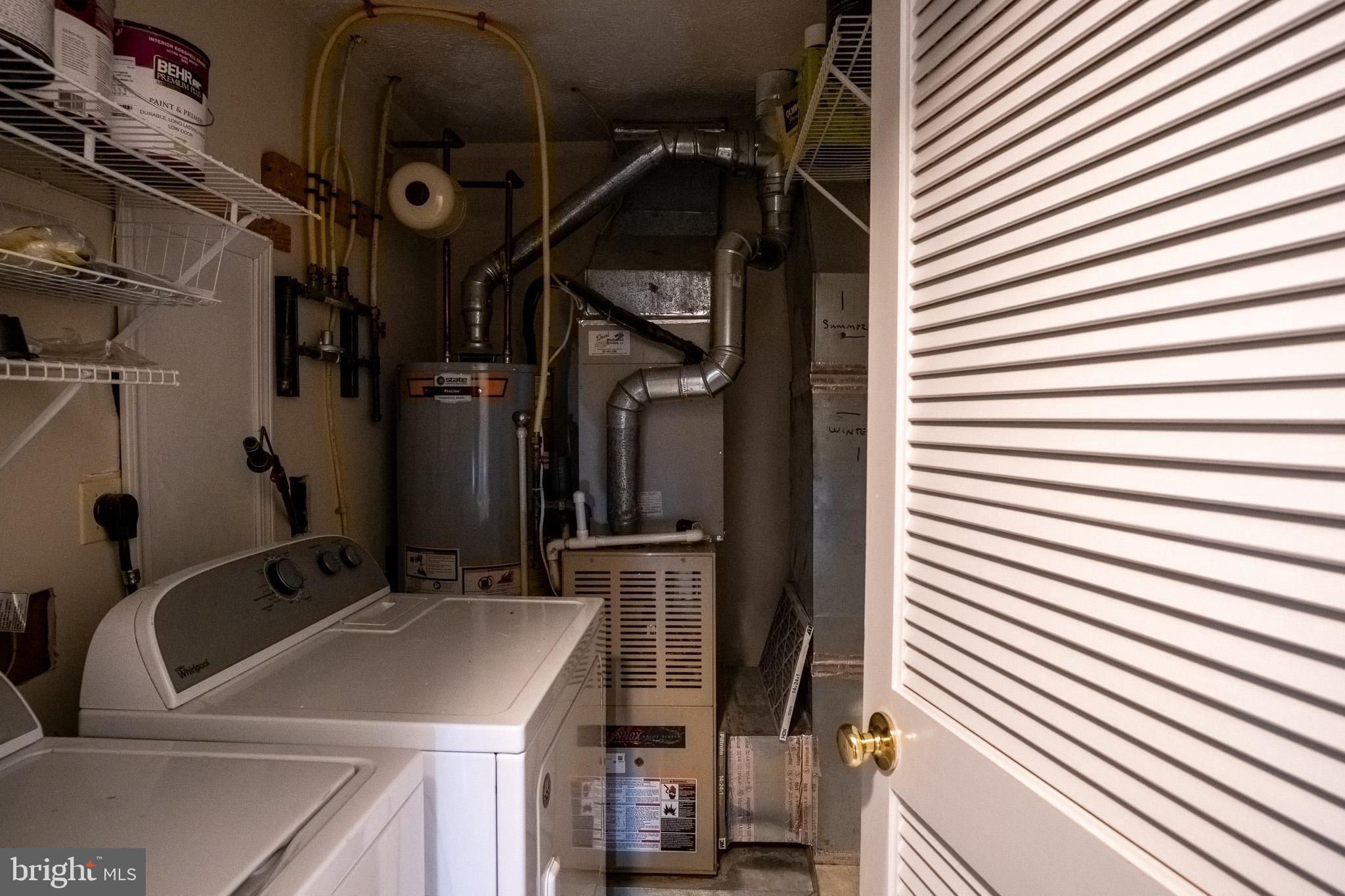 4910 Edgeware Terrace Frederick, MD 21703 - Photo 33 of 34 a bathroom with a sink and a mirror