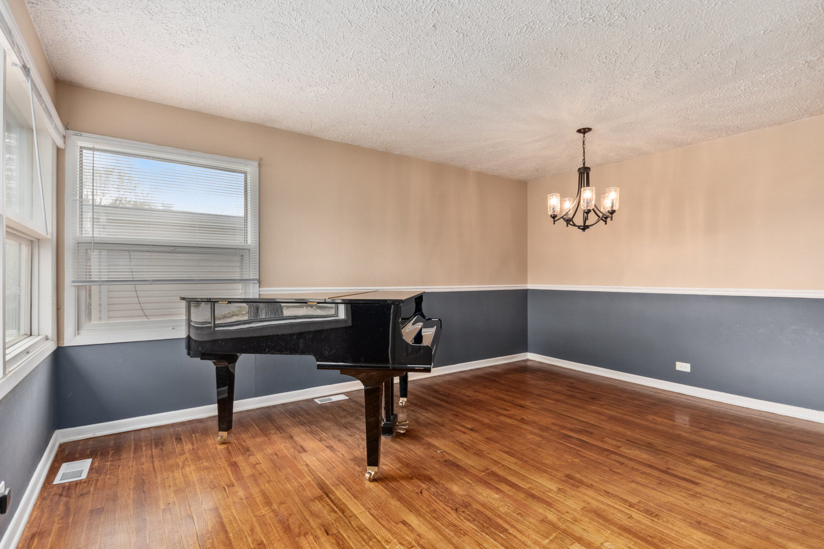 38 Highview Avenue Addison, IL 60101 - Photo 4 of 17 a view of a workspace with furniture and a window