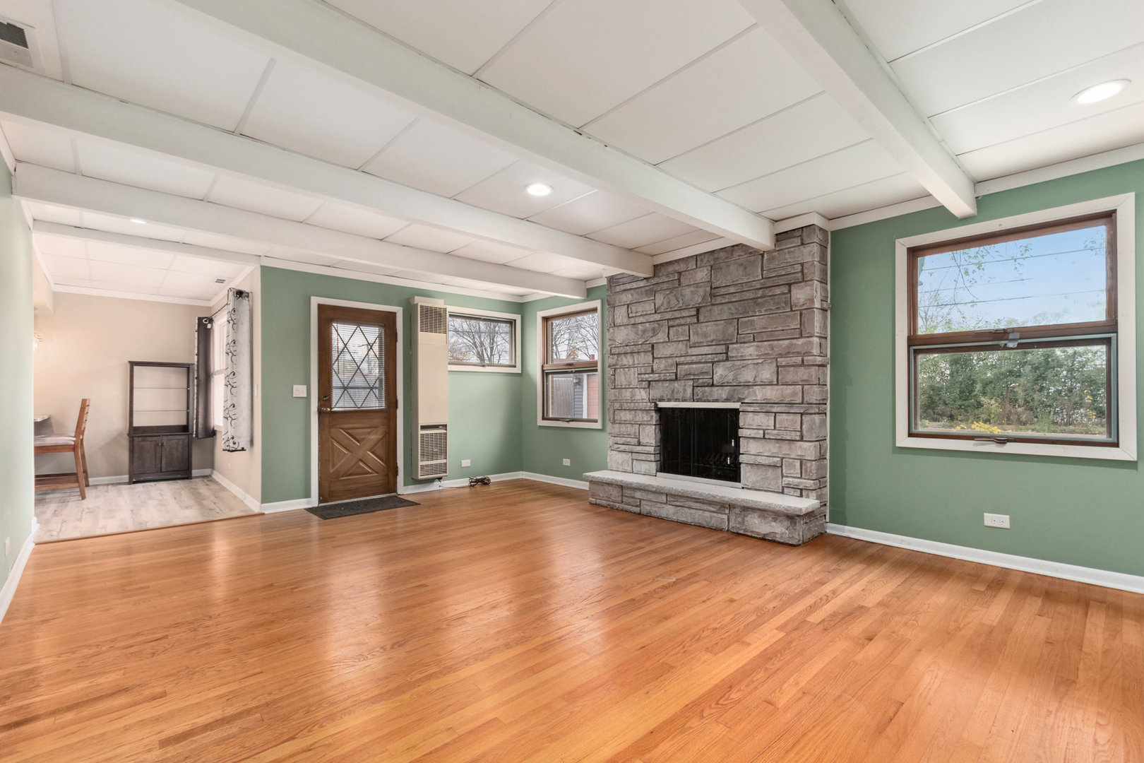 38 Highview Avenue Addison, IL 60101 - Photo 9 of 17 a view of an empty room with window and fire place