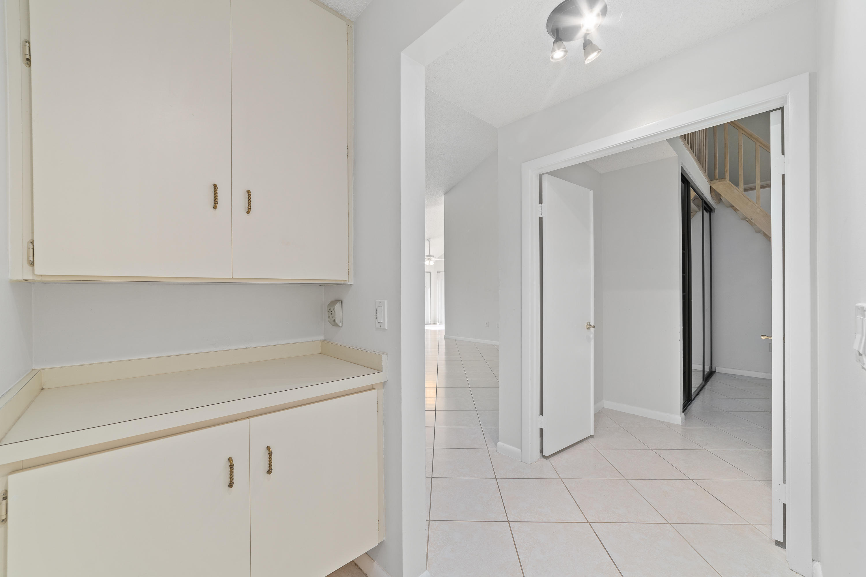 2630 Mohawk Circle West Palm Beach, FL 33409 - Photo 34 of 39 a view of a kitchen cabinets and empty racks