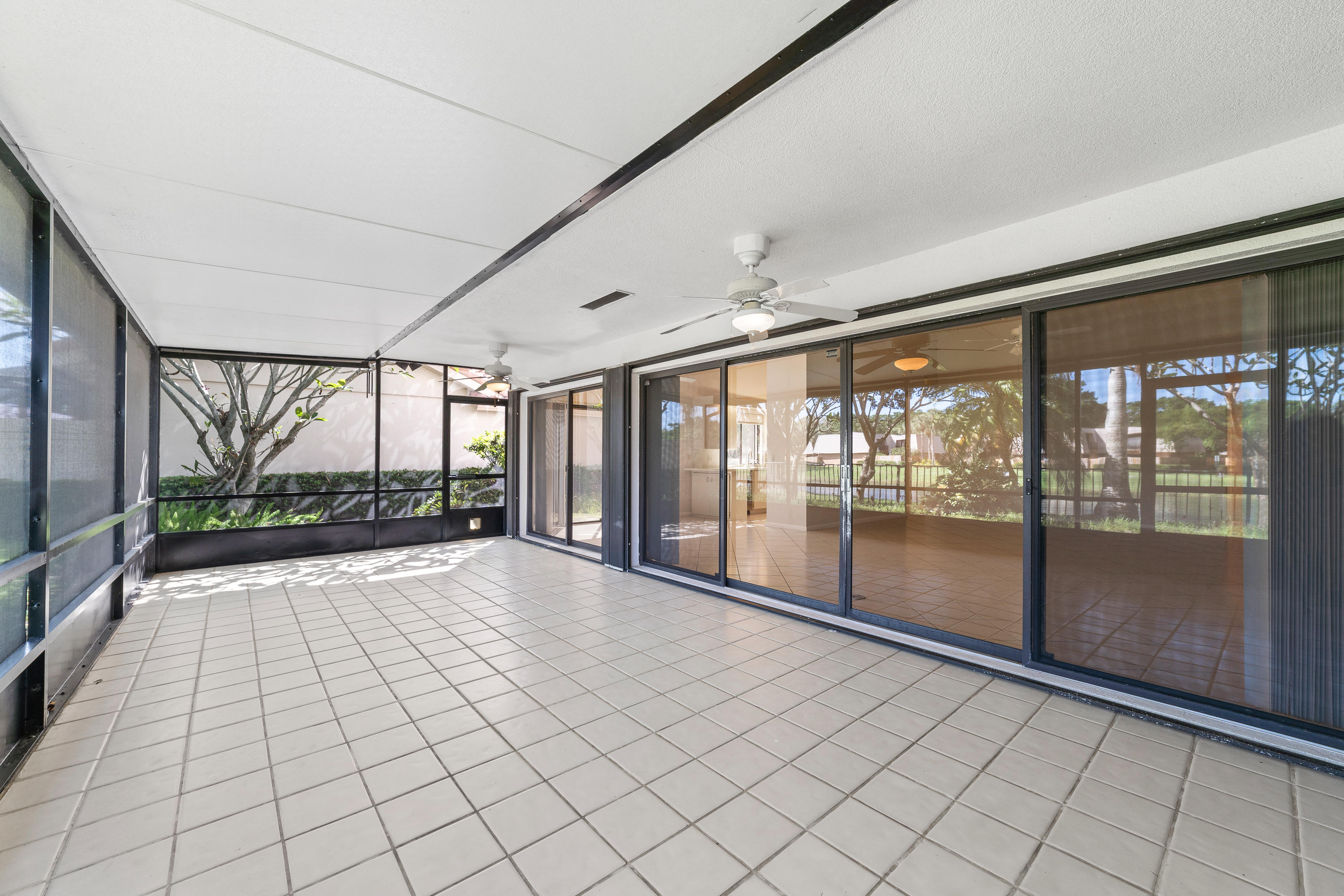 2630 Mohawk Circle West Palm Beach, FL 33409 - Photo 38 of 39 a view of an empty room with windows