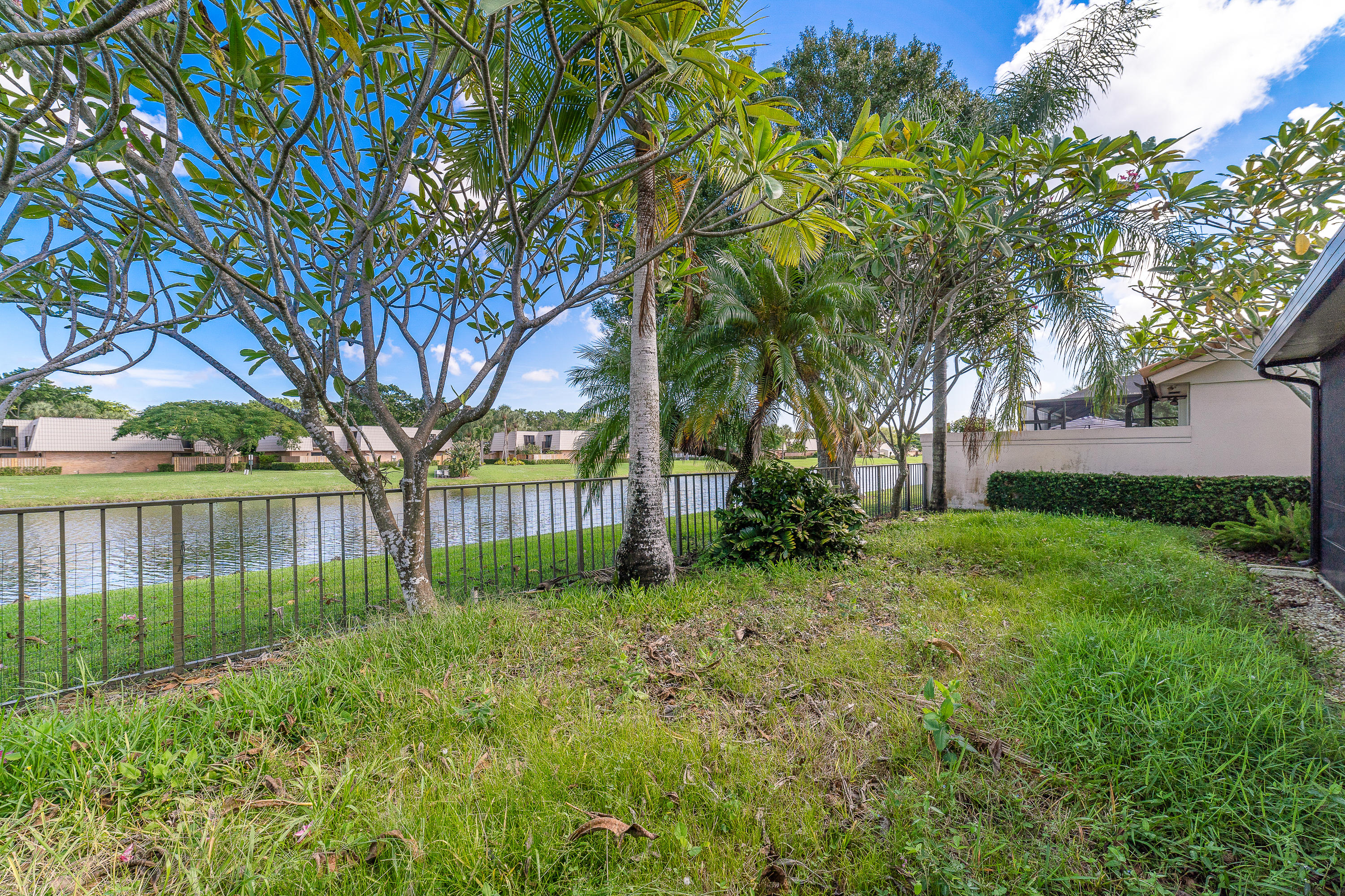 2630 Mohawk Circle West Palm Beach, FL 33409 - Photo 39 of 39 a garden covered with tall trees