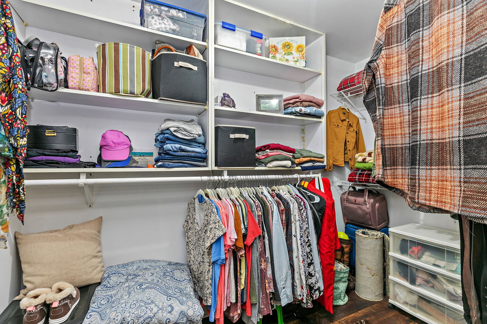 S031 Pearl Road West Chicago, IL 60185 - Photo 11 of 39 a view of walk in closet with clothes