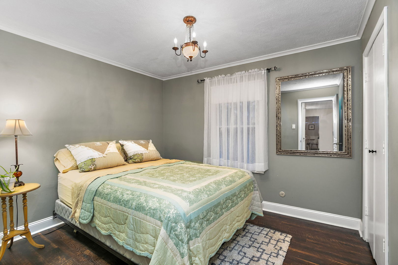 S031 Pearl Road West Chicago, IL 60185 - Photo 17 of 39 a bedroom with a bed and a chandelier