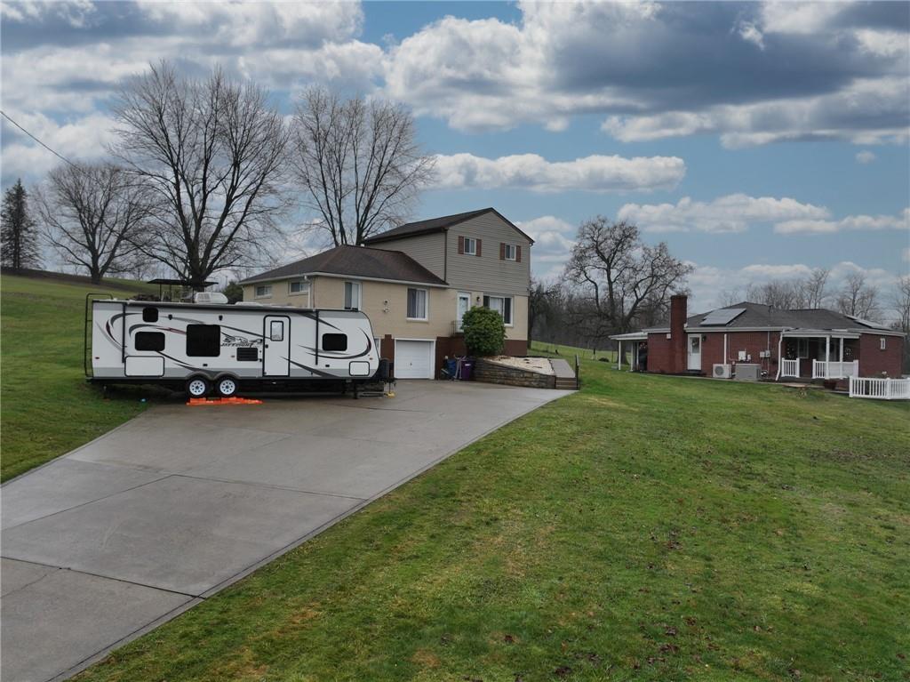 9424 Saltsburg Road Pittsburgh, PA 15239 - Photo 2 of 29 Large driveway leading up to the house with ample room for parking
