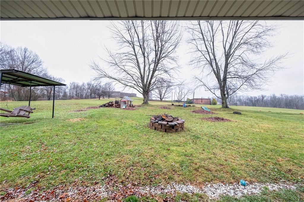 9424 Saltsburg Road Pittsburgh, PA 15239 - Photo 23 of 29 Fire pit conveniently located off the back patio, great space for entertaining