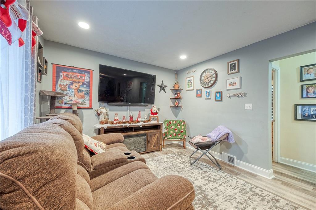 9424 Saltsburg Road Pittsburgh, PA 15239 - Photo 4 of 29 Recessed lighting and newer LVT flooring in LR