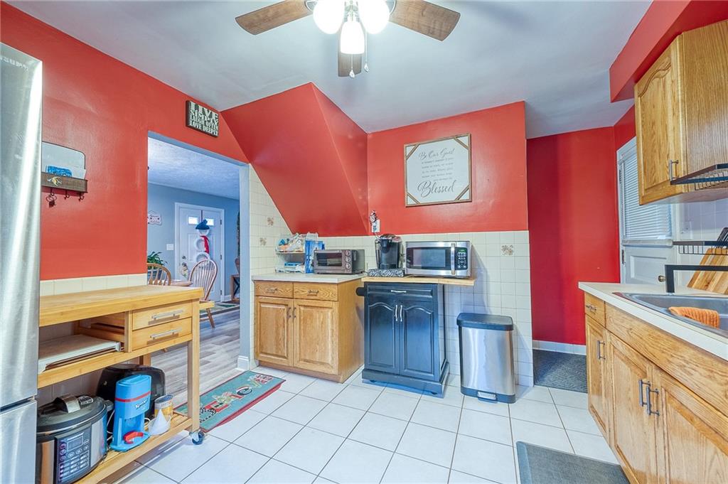 9424 Saltsburg Road Pittsburgh, PA 15239 - Photo 8 of 29 Located next to the dining room with a door to the back patio