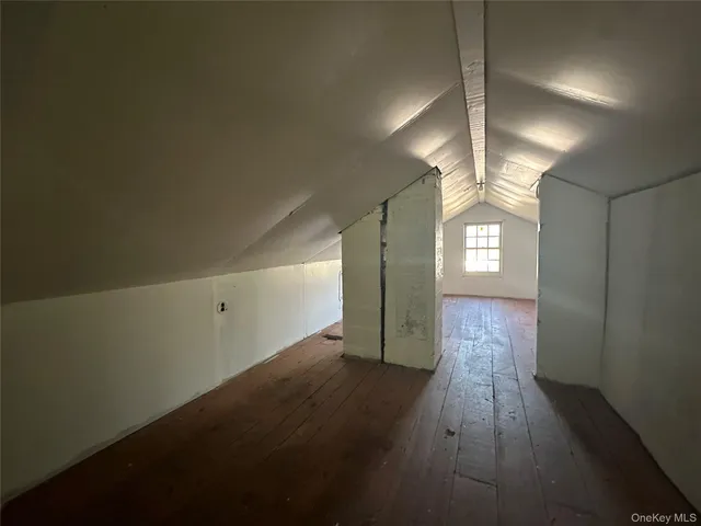 a view of empty room with windows
